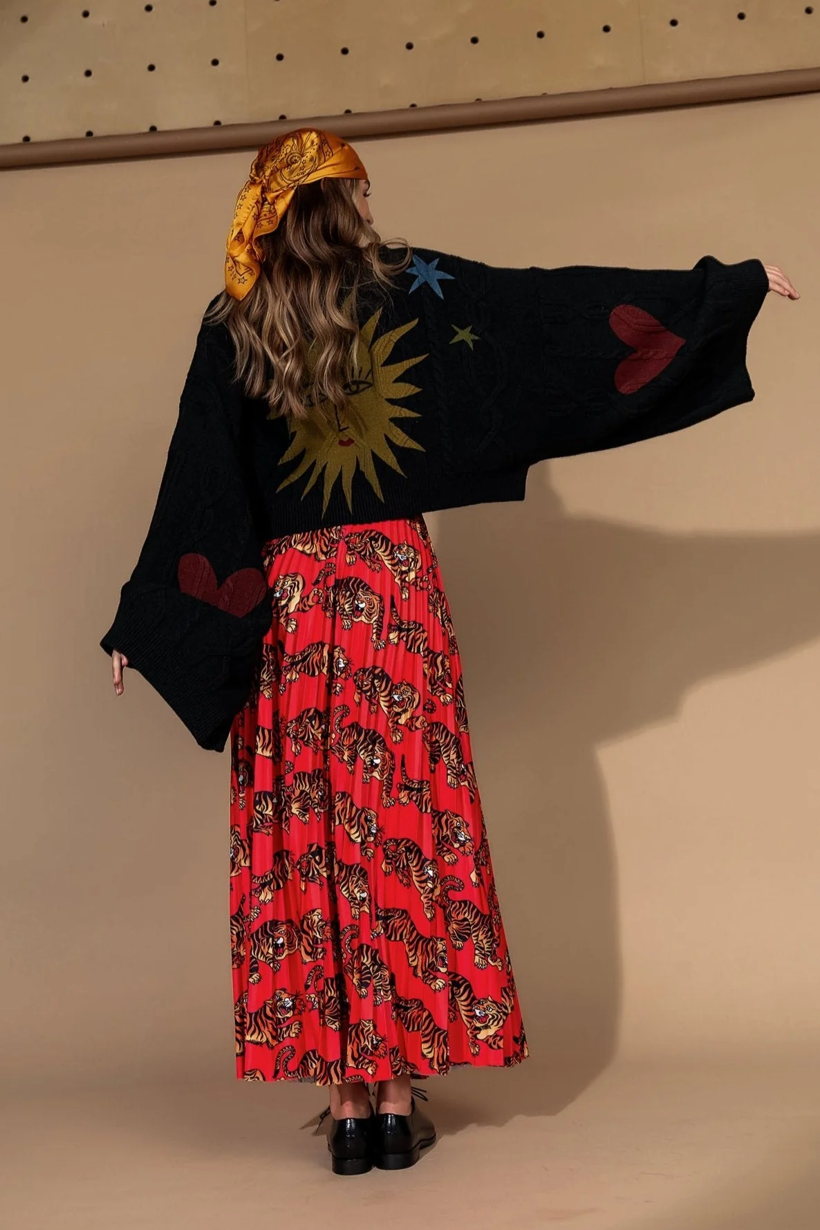 Don't Let Them Tame You Pleated Midi Skirt